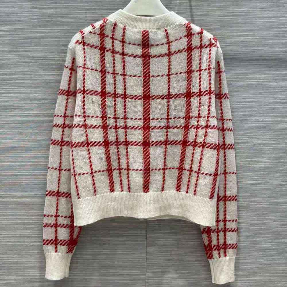 Side angle showing check’n’dior pattern on technical wool cardigan