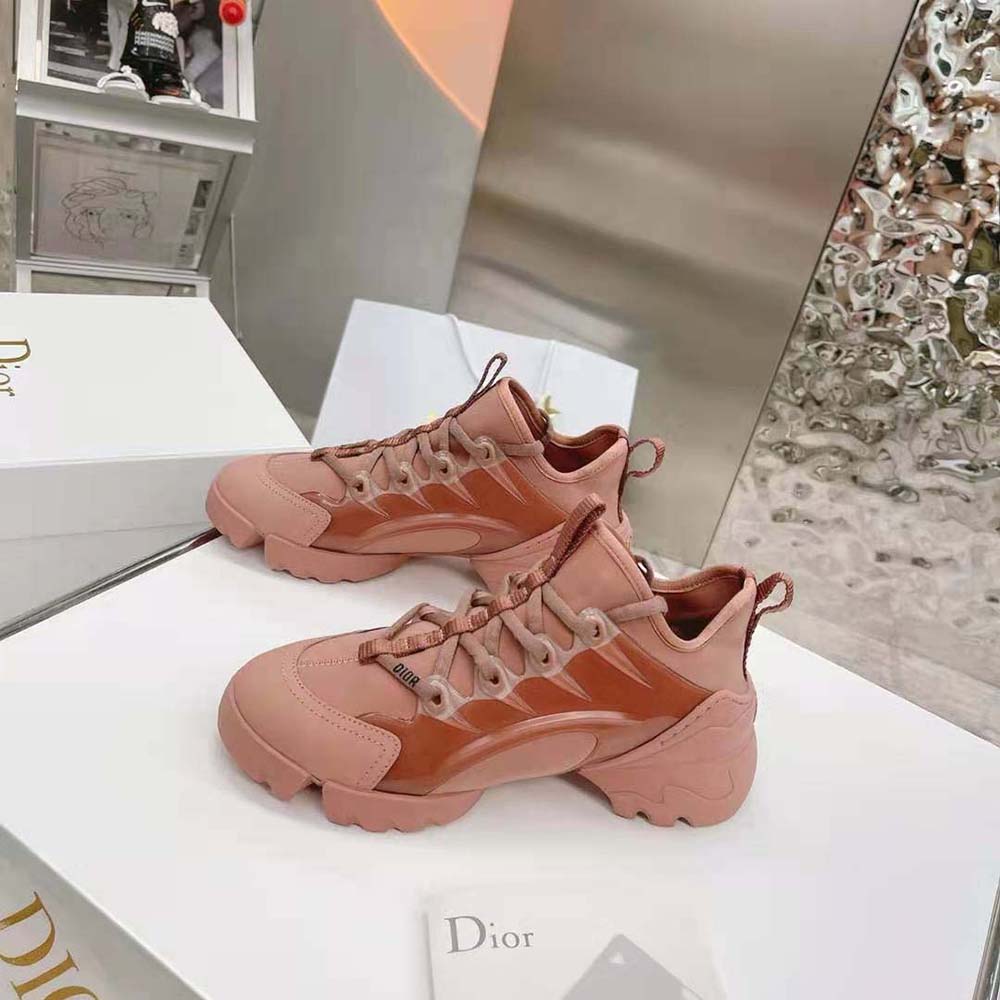 Close-up of Dior logo on tongue of pink D-connect sneaker