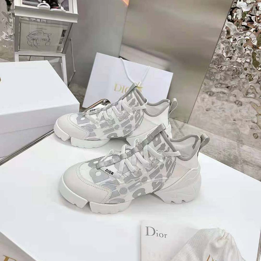 Close-up on white spatial print and lace closure on Dior Women D-connect Sneaker