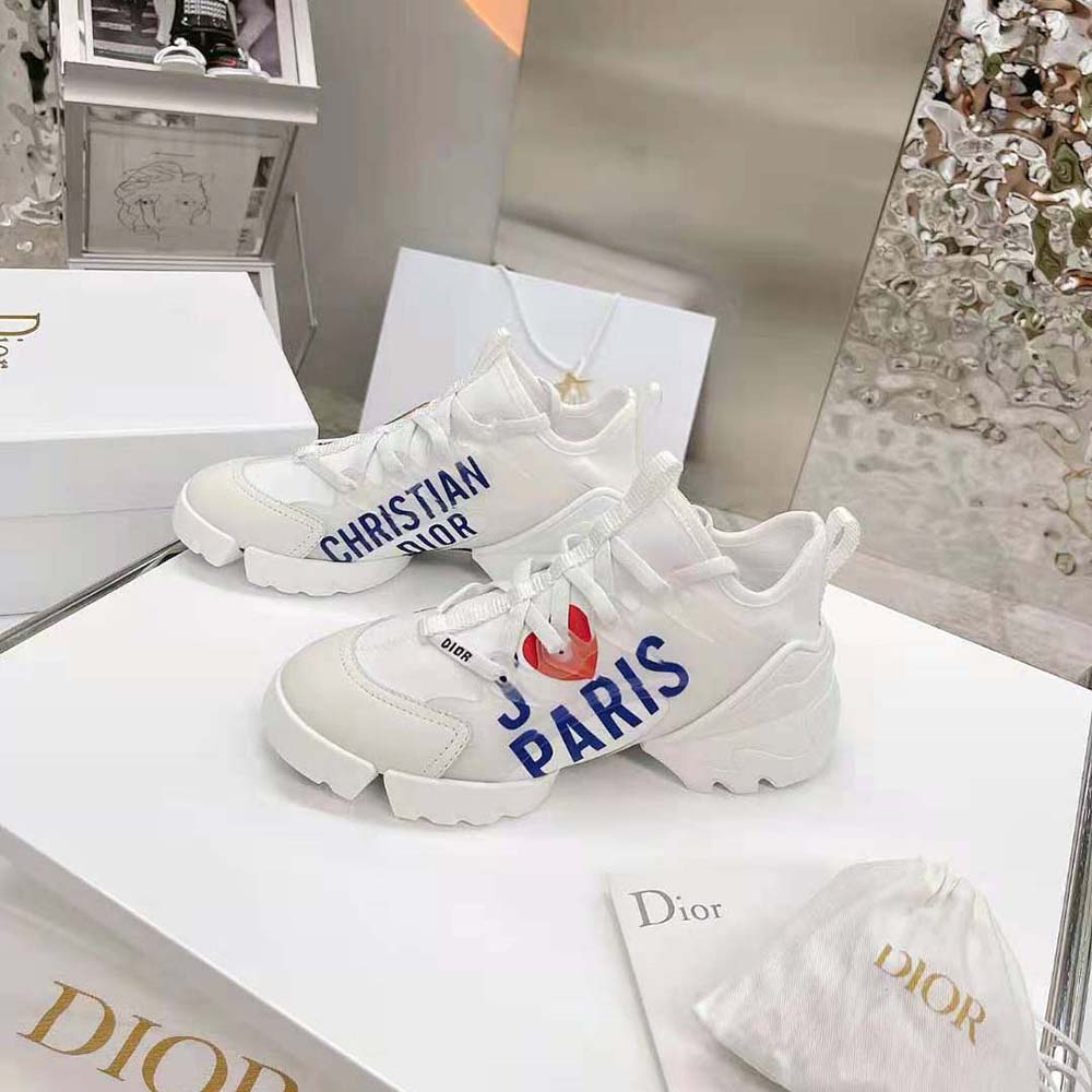 Close-up detail of J Adior motif on white Dior Women D-connect Sneaker