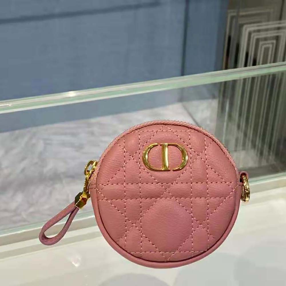Close-up of pink leather Cannage stitching on Dior coin purse