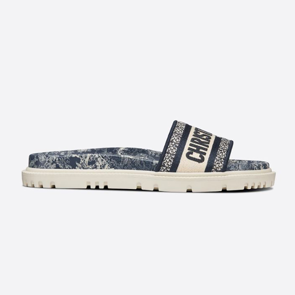 Side view of Dior Women Dway Slide Deep Blue Toile de Jouy Reverse Embroidered Cotton