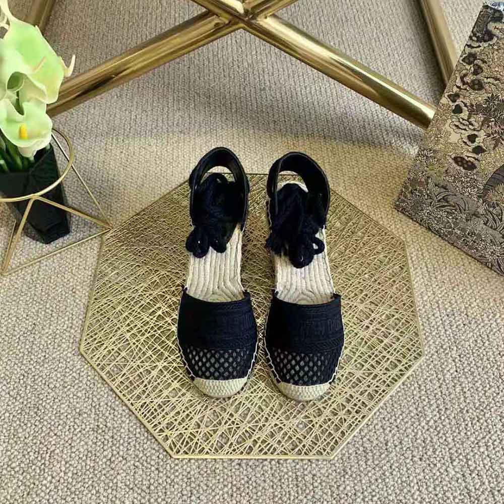 Close-up detail of mesh embroidery on Dior Women Granville Wedge Espadrille