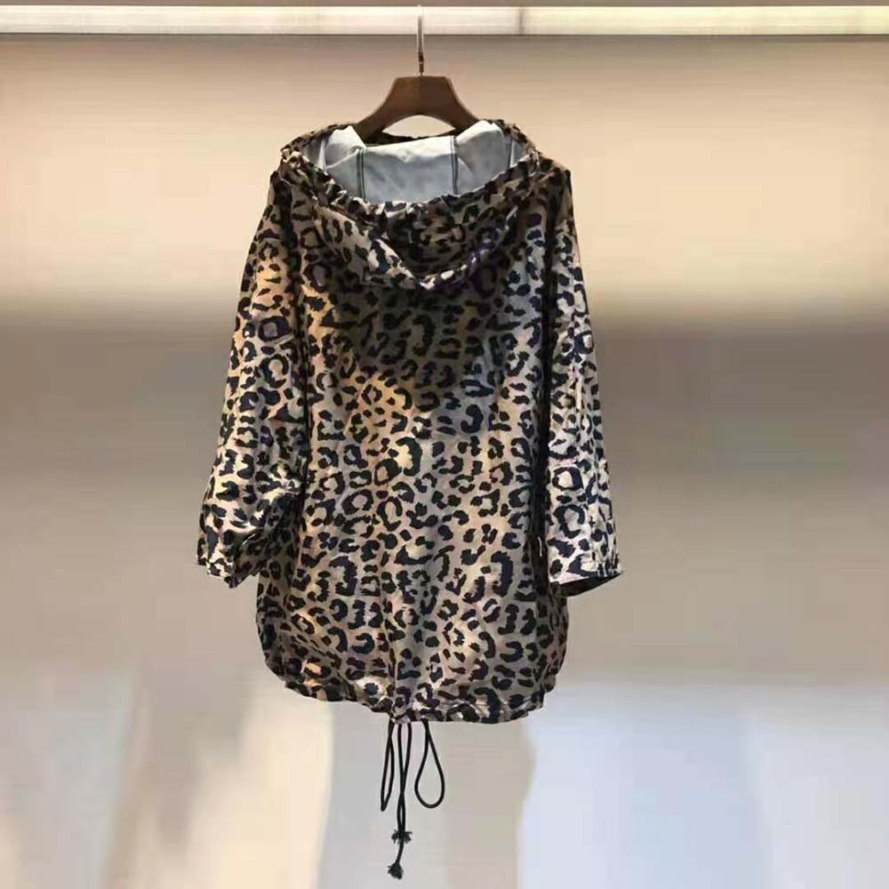 Side angle showing silhouette and signature Dior hardware on anorak
