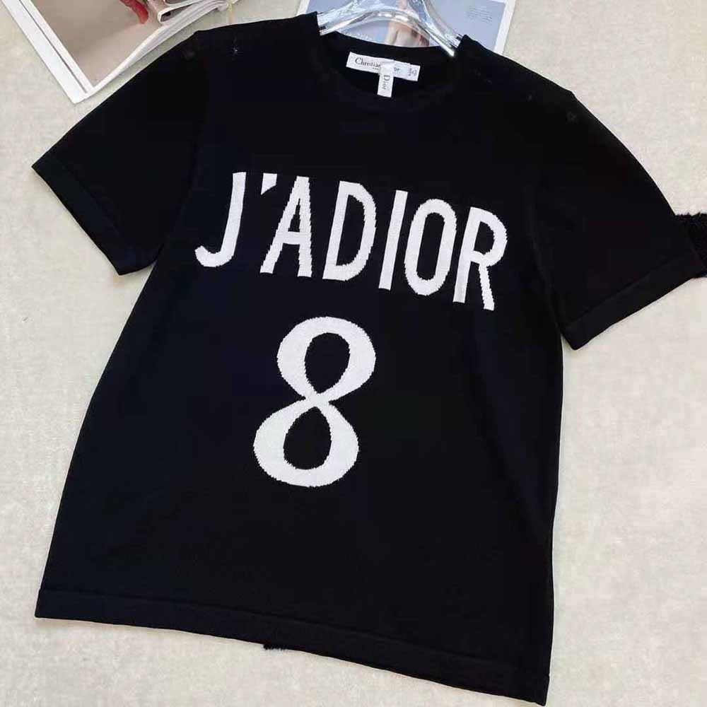 Close-up of J’adior embroidered logo on black Dior Women t-shirt