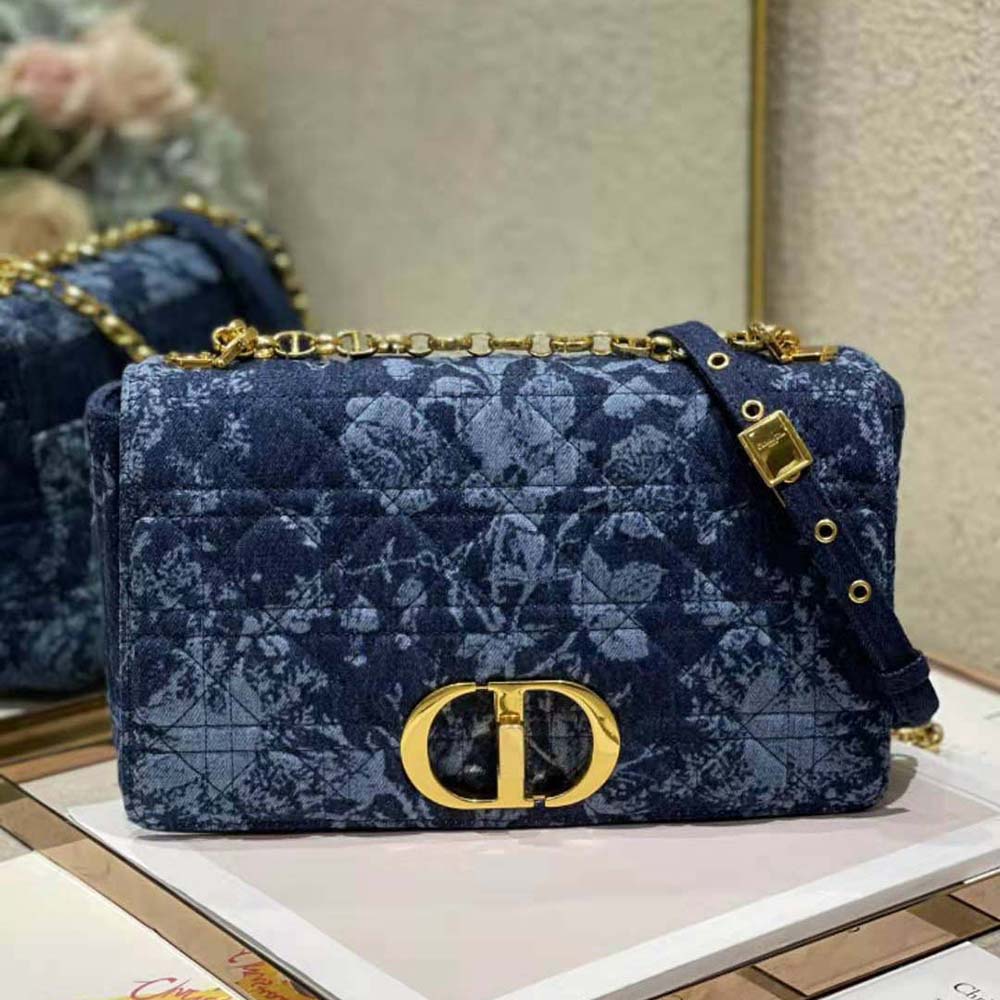 Close-up of floral Cannage embroidery on Dior Women Large Dior Caro Bag