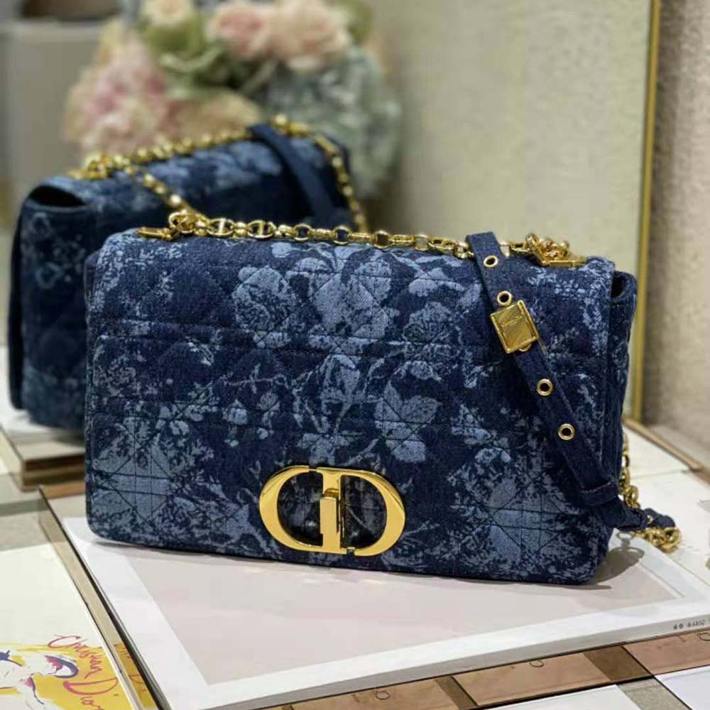 Side profile showing silver-tone hardware on Dior Women Large Dior Caro Bag