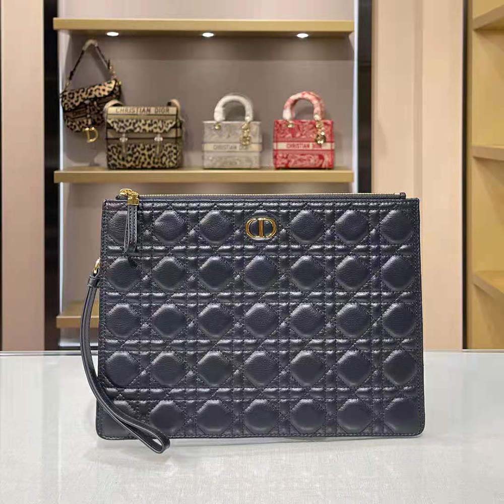 Close-up of Cannage stitching and silver hardware on Dior pouch