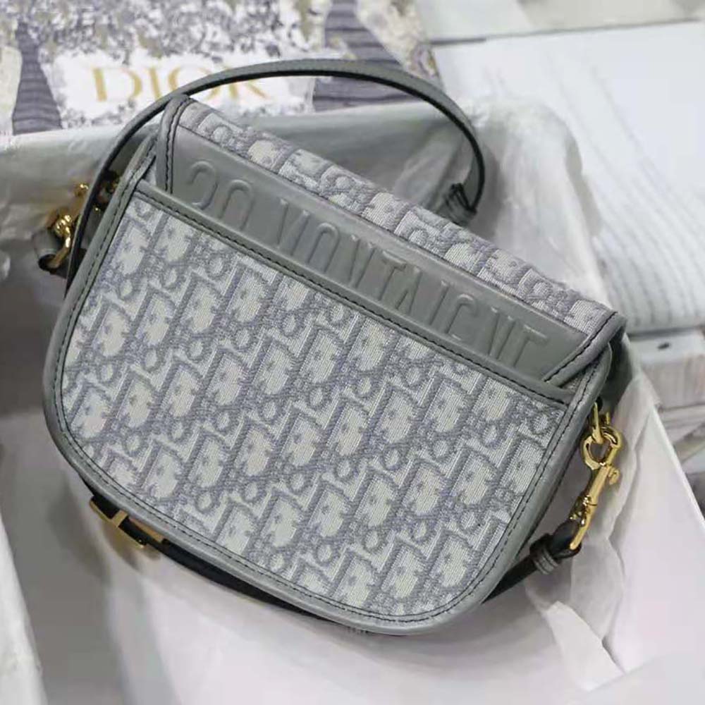 Side angle showing silhouette and strap of Dior Women Medium Dior Bobby Bag