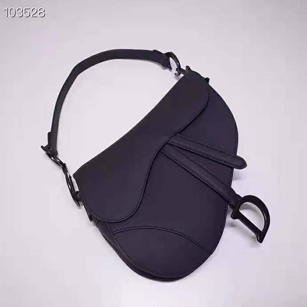 Side angle showing silhouette of Dior Women Mini Saddle Bag Black Ultramatte Calfskin