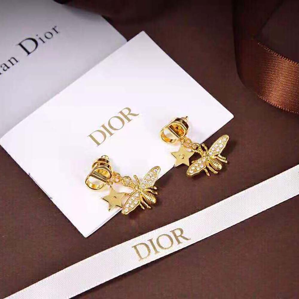 Side angle showing post closure on Dior Women Petit CD Earrings