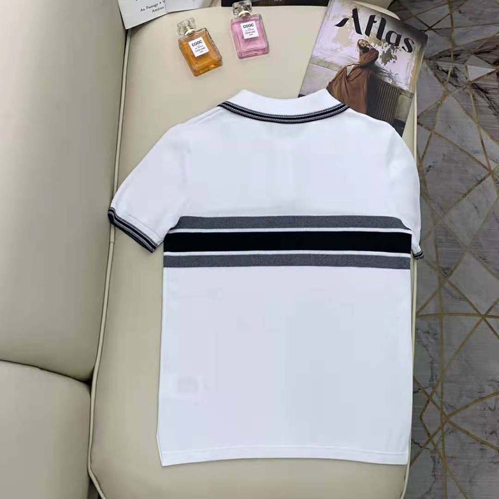 Side angle showcasing fit of Dior Women Polo Shirt White and Navy Blue