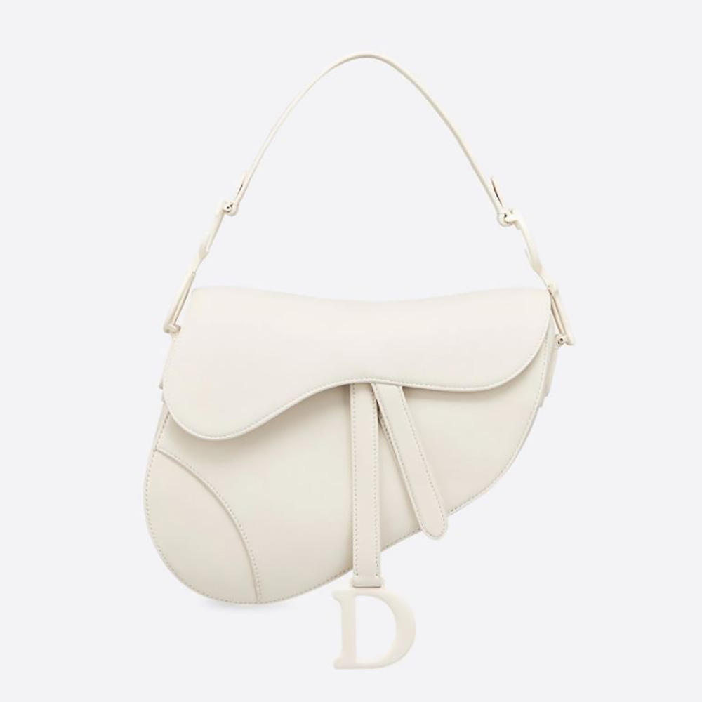 Front view of Dior Women Saddle Bag Latte Ultramatte Calfskin in white