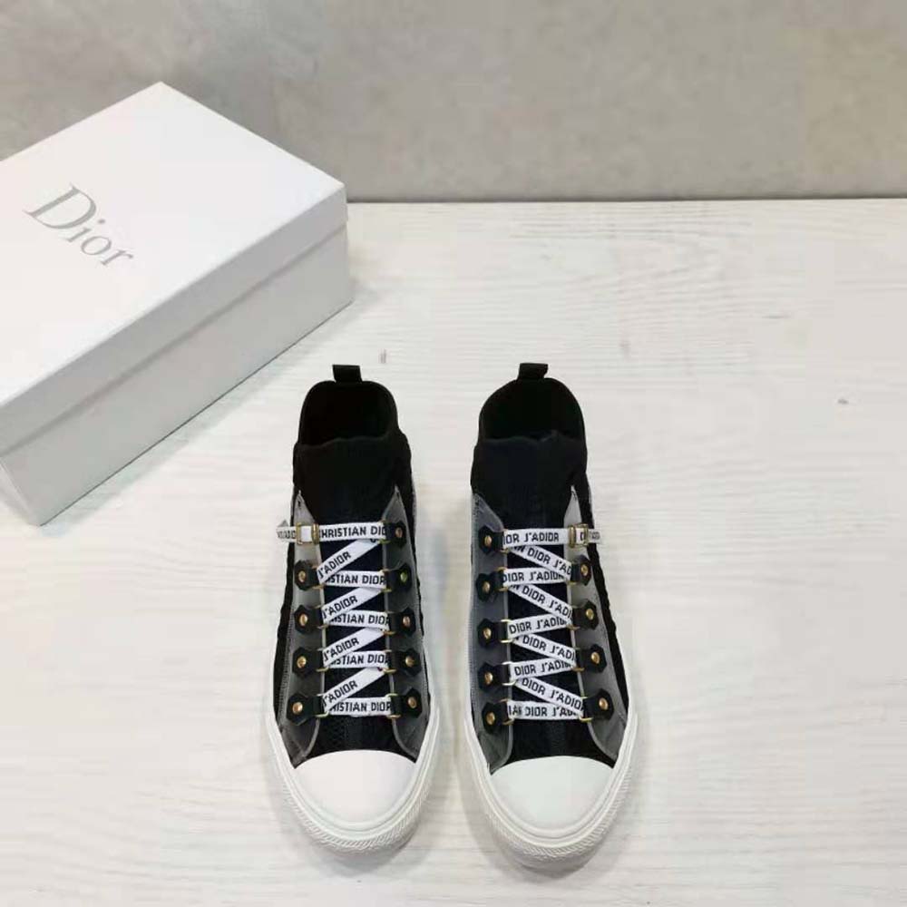 Close-up of Dior cannage stitching on black mesh sneaker
