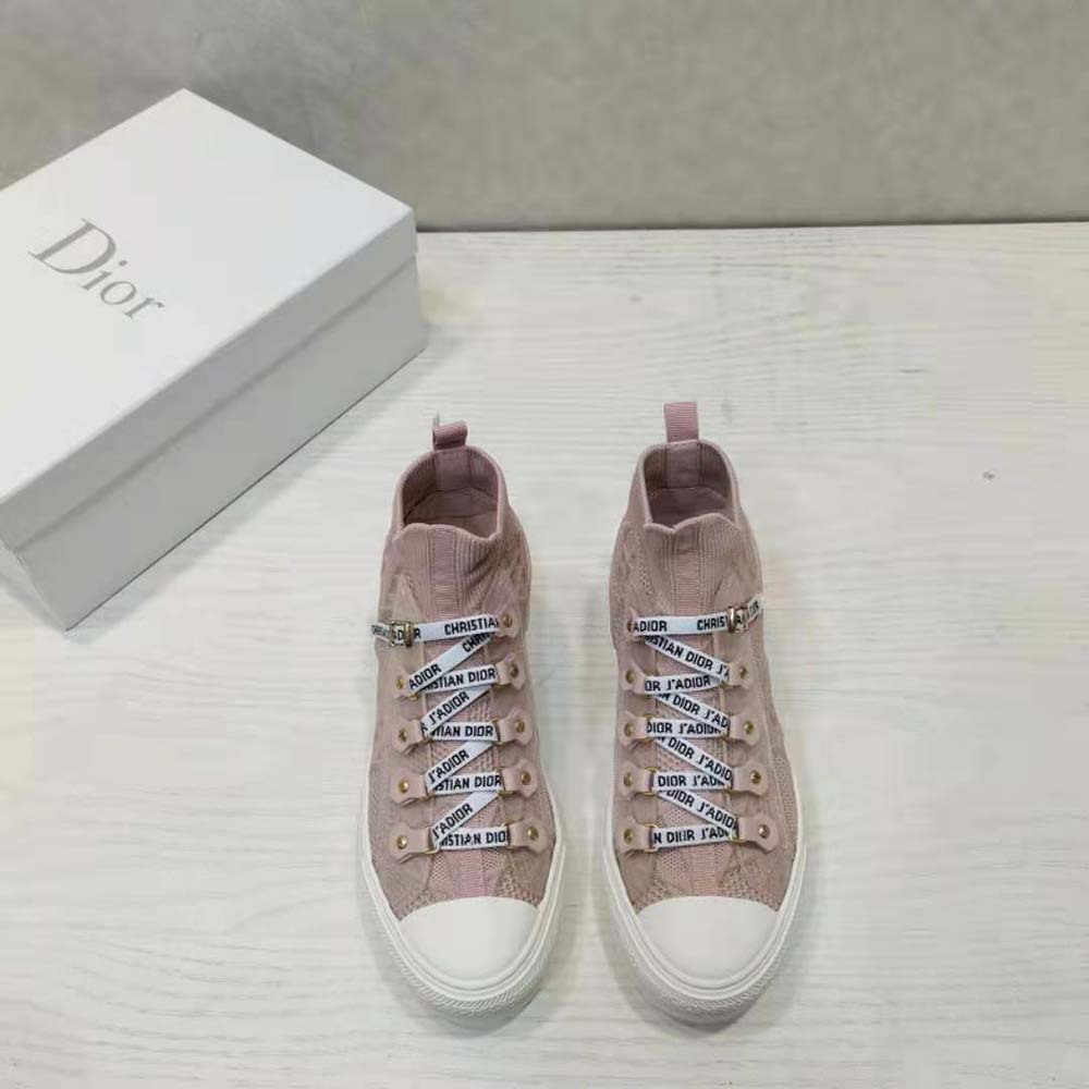 Close-up of pink technical mesh and Cannage stitching on Dior sneaker