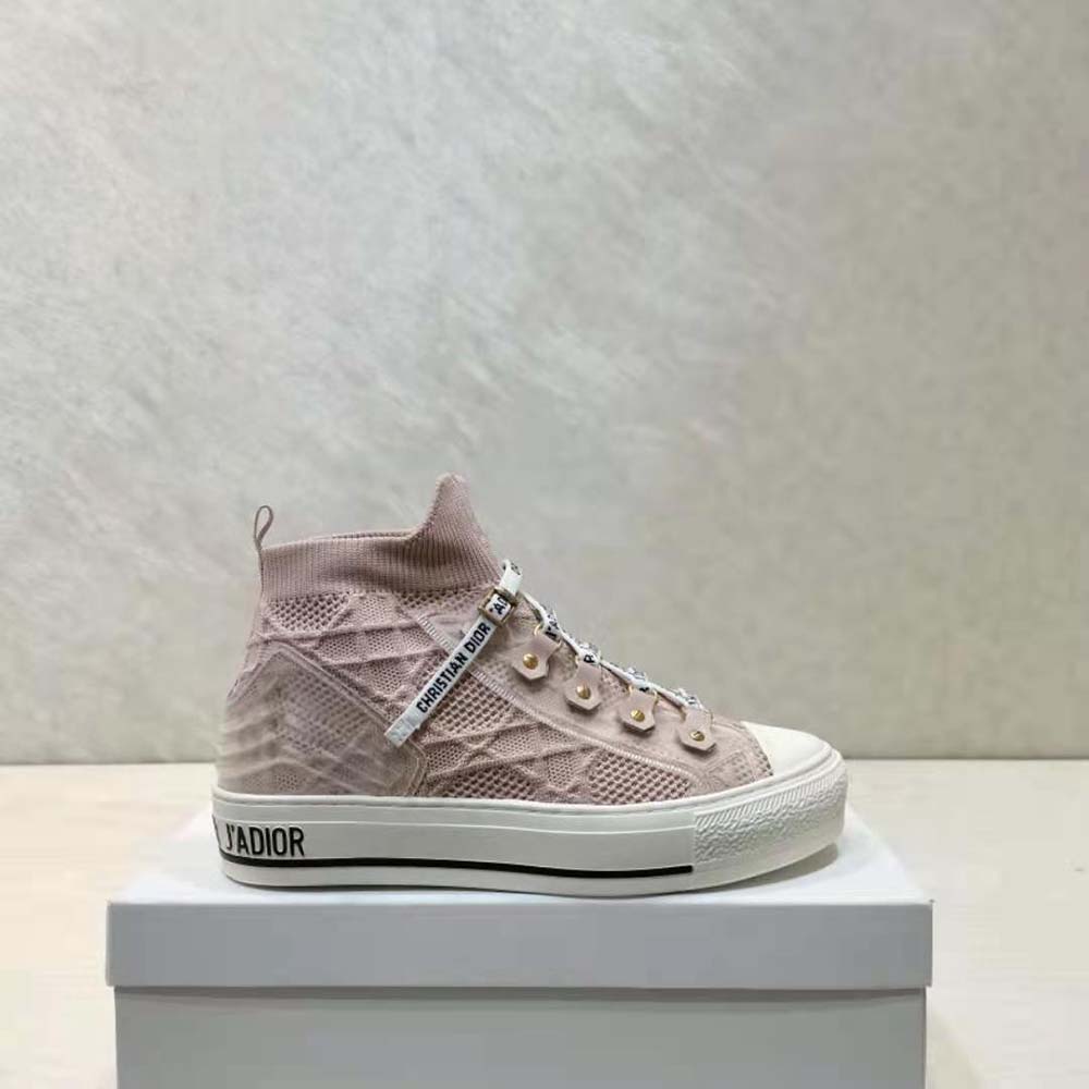 Overhead shot showcasing lace-up closure and Dior logo hardware