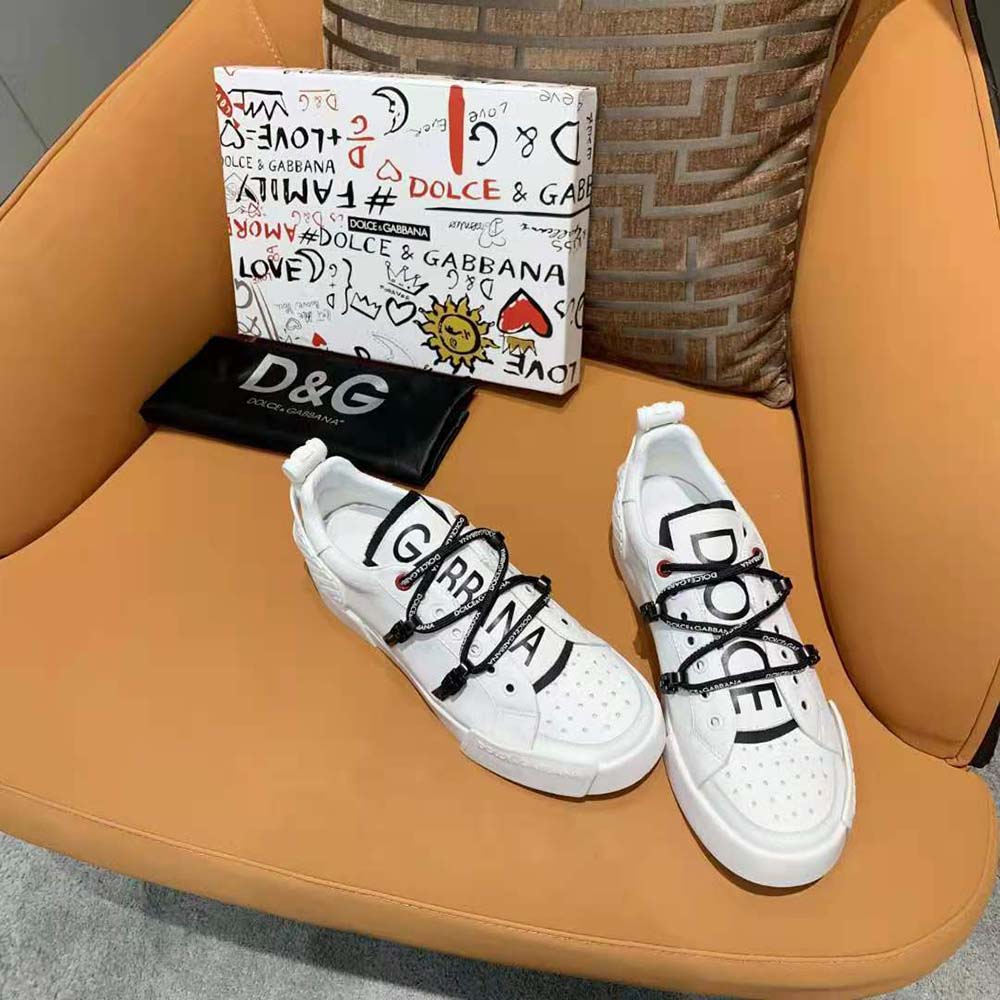 Close-up on lace-up closure and embossed logo on Portofino Sneakers