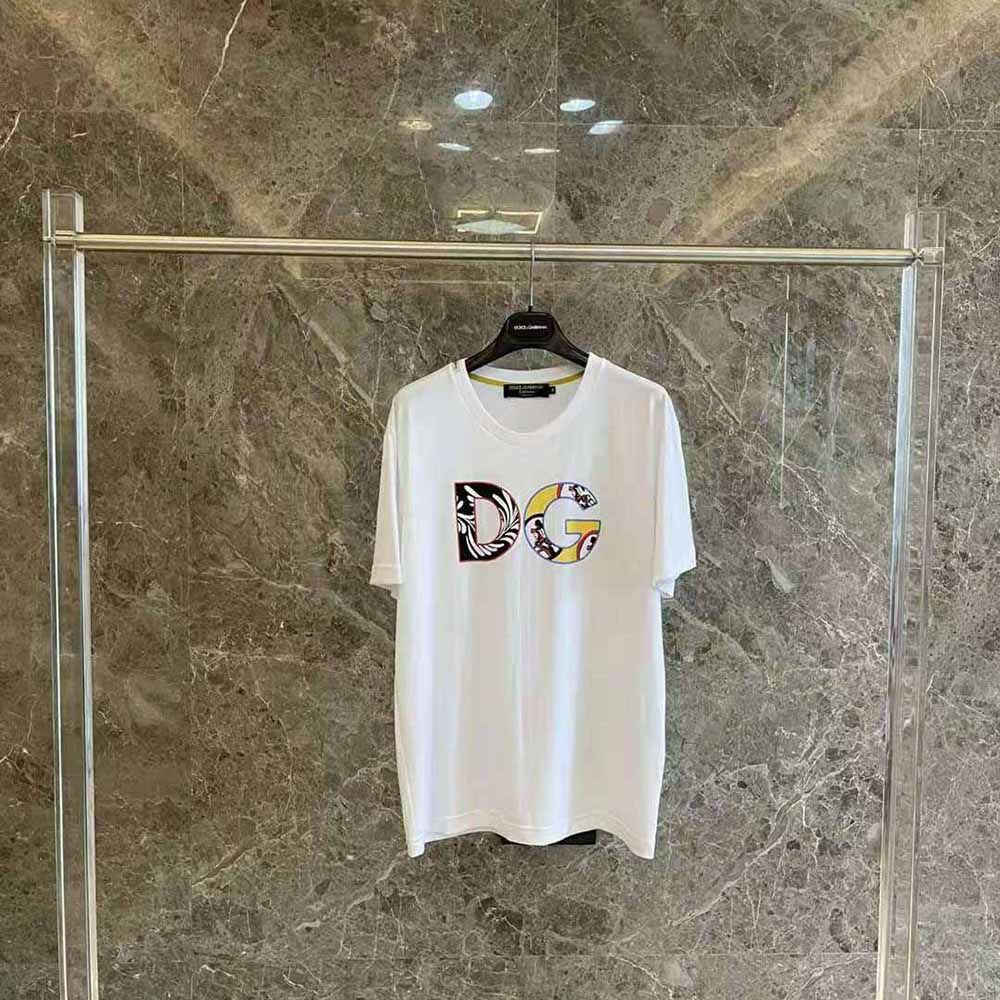 Close-up of DG patch detail on white Dolce Gabbana D&G cotton T-shirt