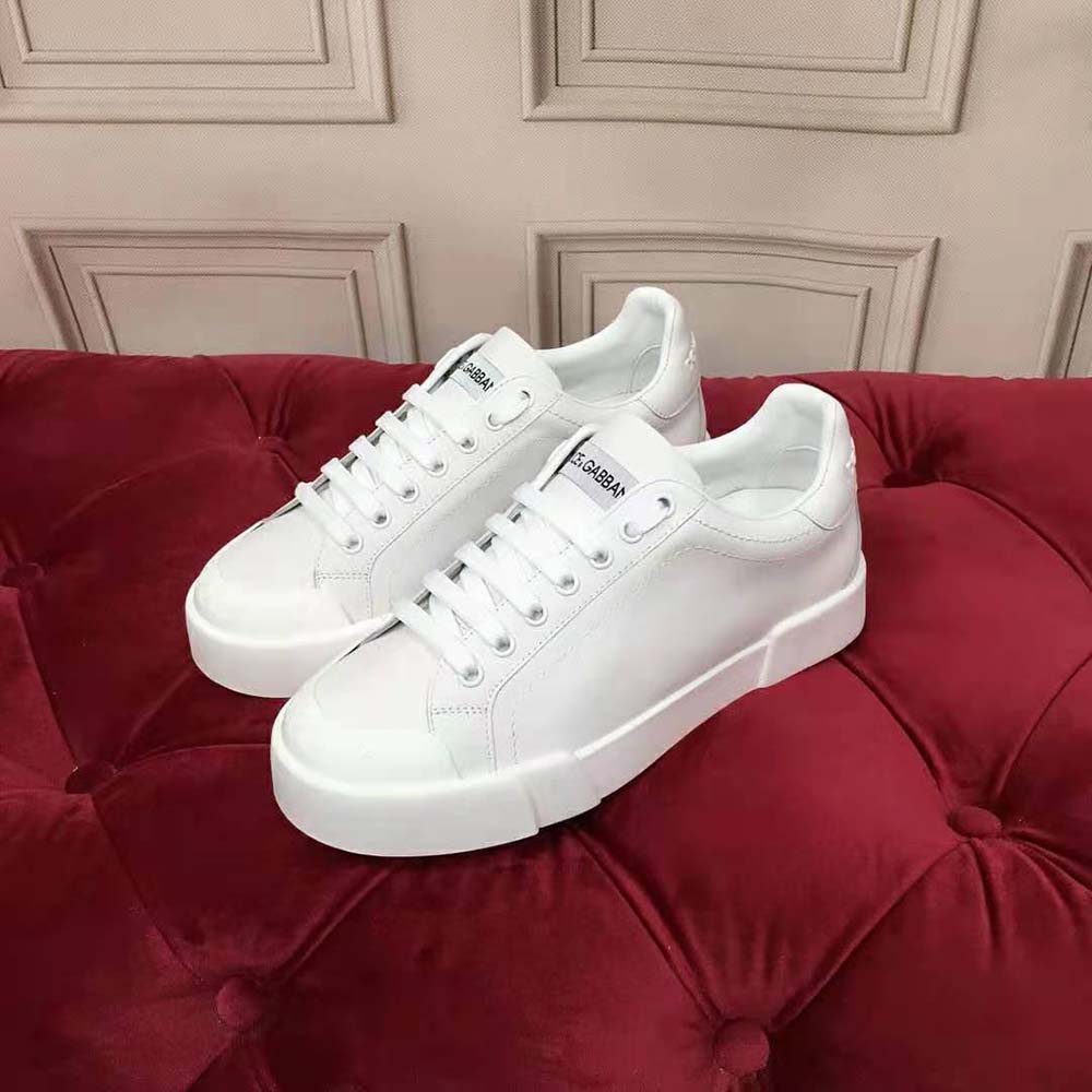 Close-up of white nappa leather and rubber toe-cap on Dolce Gabbana D&G Portofino Sneakers