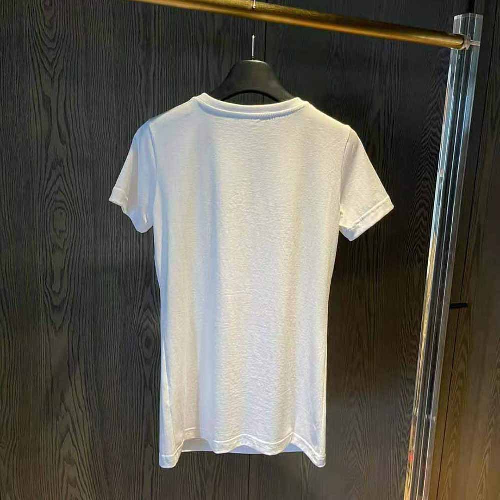 Side profile showing short sleeve and relaxed fit of Dolce Gabbana D&G t-shirt