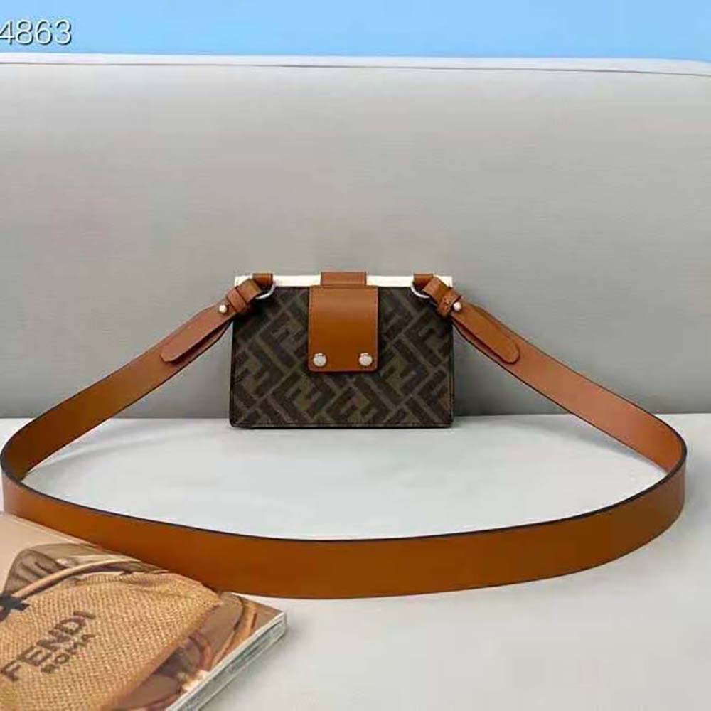 Side profile showing adjustable shoulder strap on Fendi Men Baguette Pouch