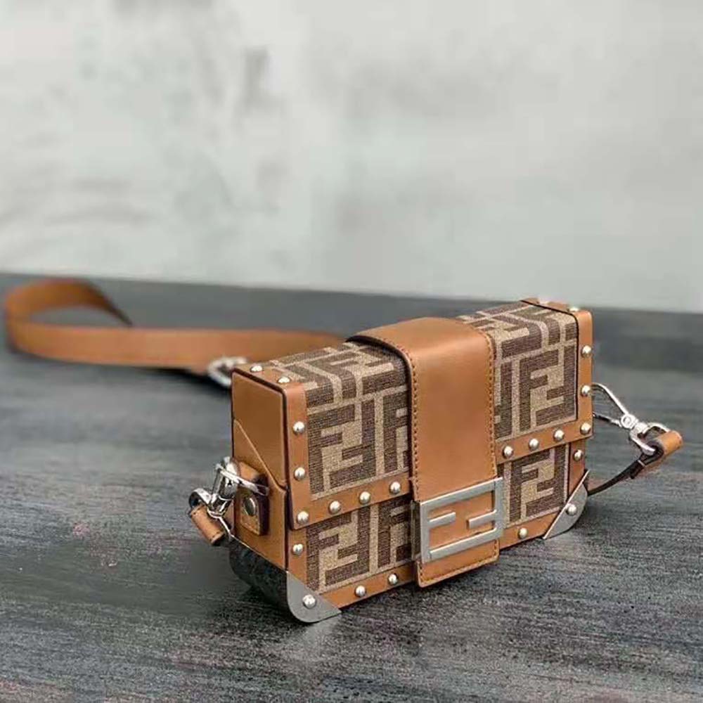 Side profile of Fendi Men Baguette Trunk Mini Brown Fabric Bag with adjustable strap