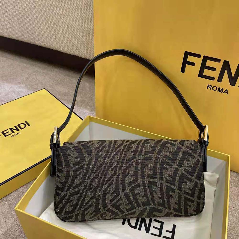 Side profile showing silhouette and strap of Fendi Women Baguette 1997 Brown Jacquard Bag
