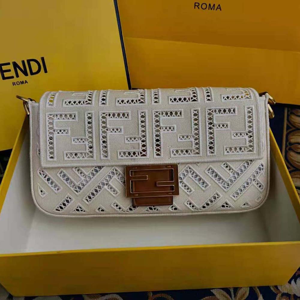 Side angle showing gold-tone hardware on Fendi Women Baguette Canvas Bag with Embroidery-White