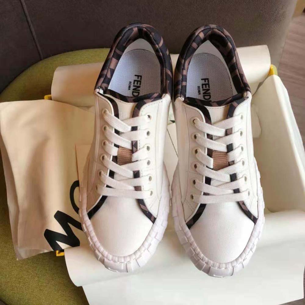 Close-up of white canvas and TPU detail on Fendi Women Force sneakers