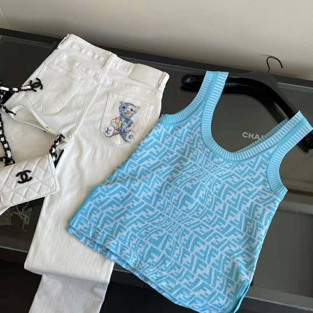Side angle showing relaxed fit of Fendi Women Light Blue Viscose Top