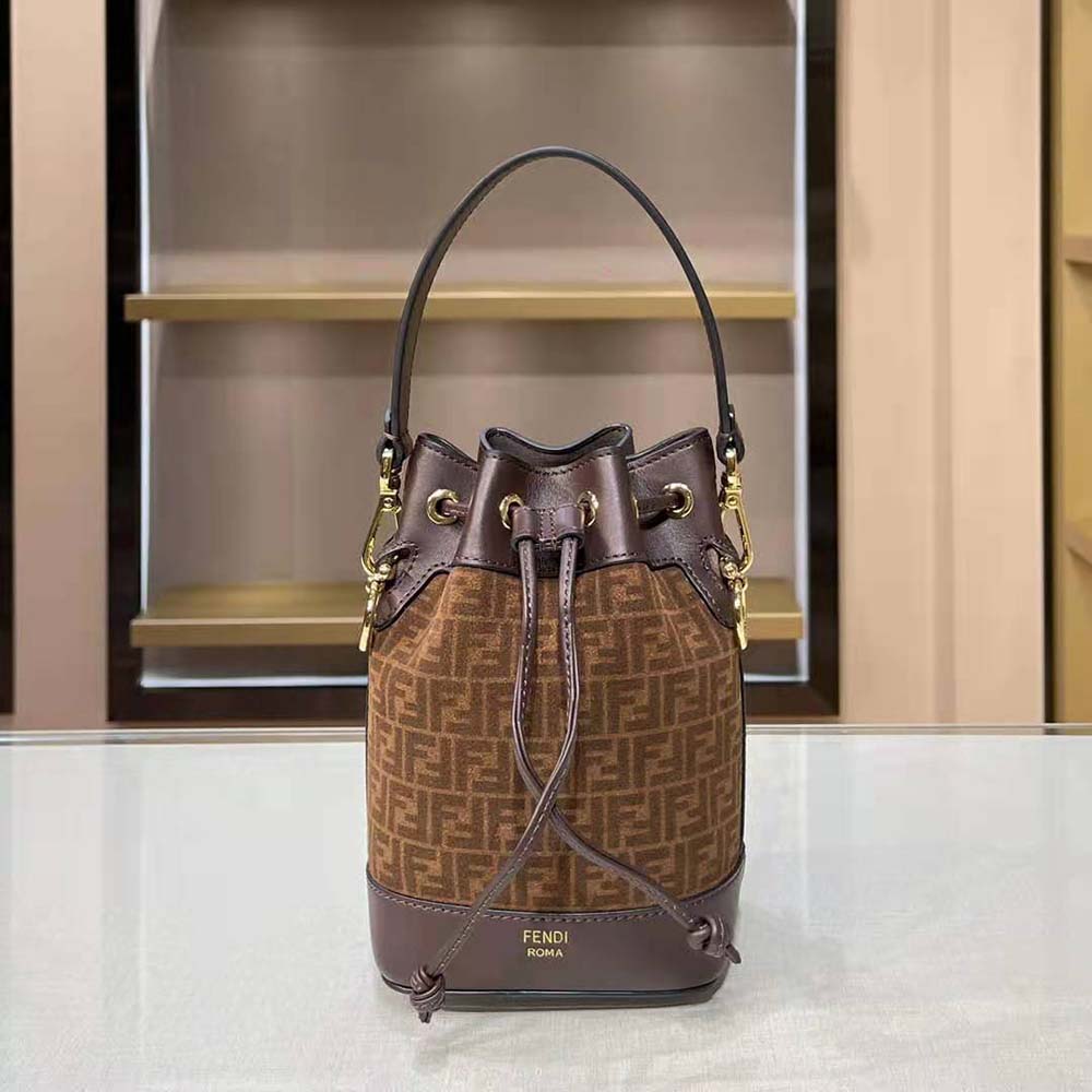 Close-up of gold hardware and embossed FF print on Fendi mini-bag