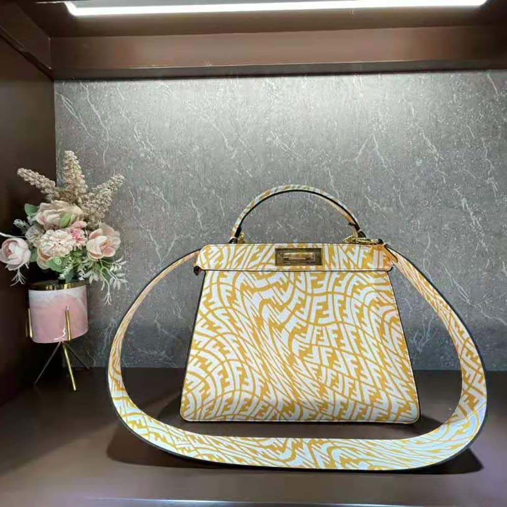 Close-up of FF Vertigo gold-tone hardware on Fendi Women Peekaboo Iseeu Medium bag