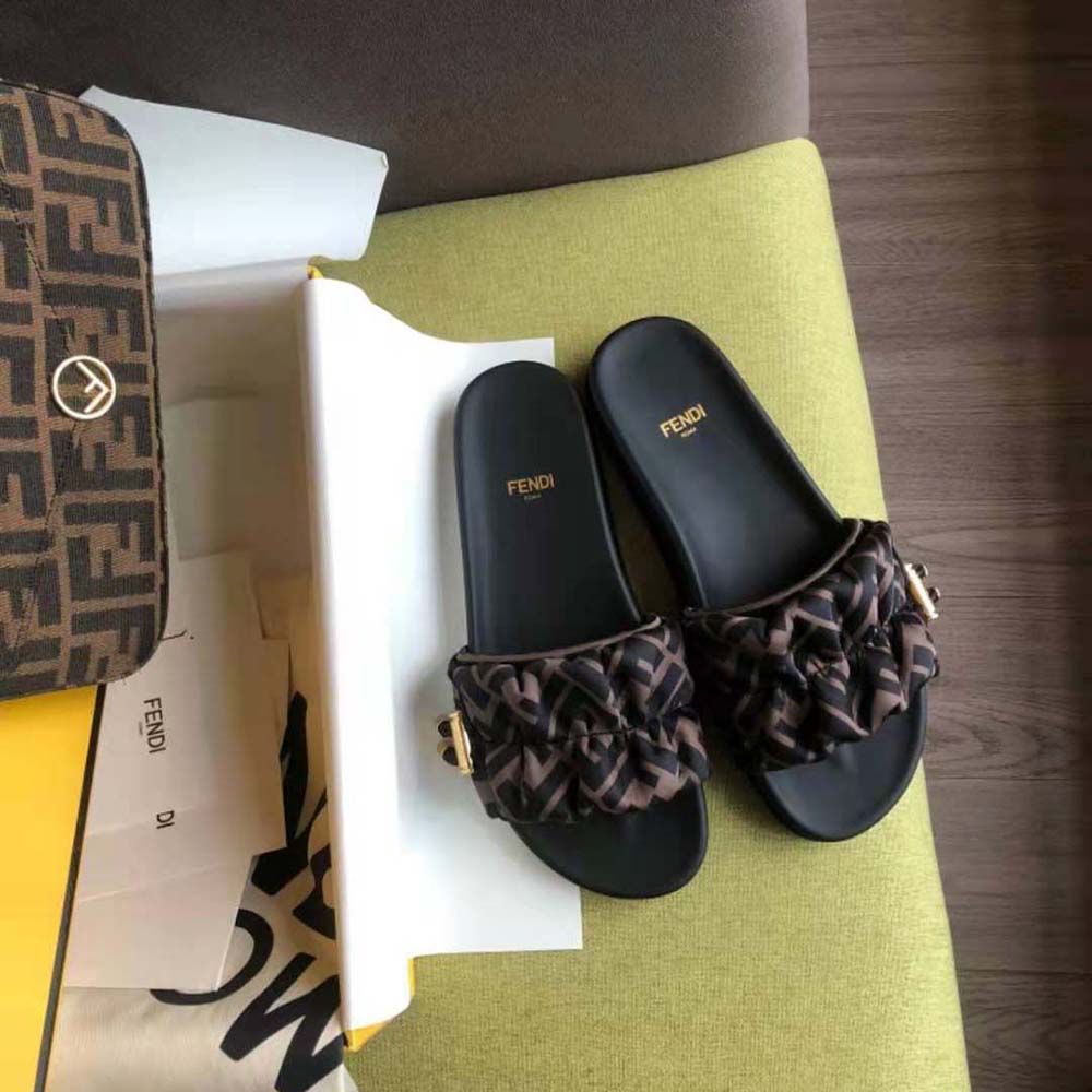 Overhead shot of open-toe Fendi Women Vertigo Brown Satin Slides