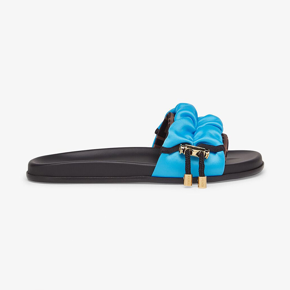 Side angle of Fendi Women Vertigo Light Blue Satin Slides showing satin finish