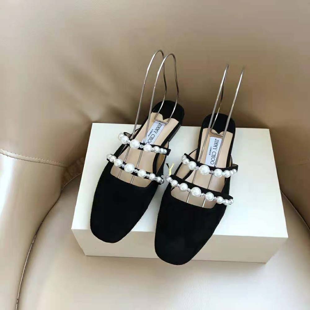 Top-down angle showing toe and suede texture of Jimmy Choo Alaina Flats