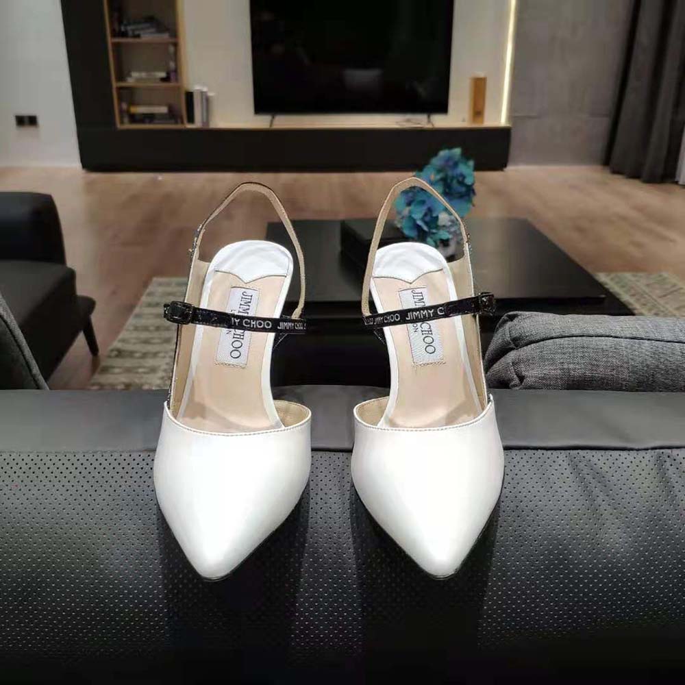 Close-up of logo-woven ribbon detail on Jimmy Choo Women Ray 65 pumps