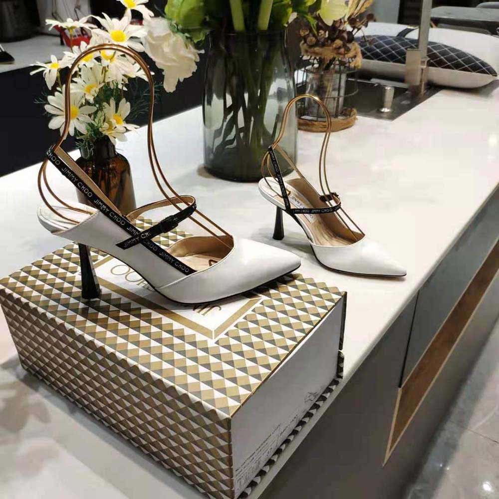 Angled shot highlighting pointed toe and 65mm heel of Jimmy Choo pumps