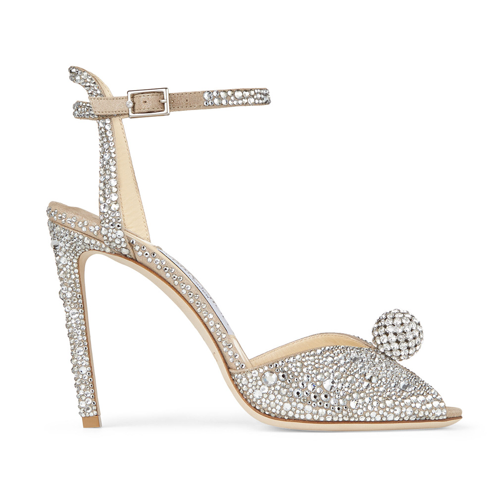 Side view of Jimmy Choo Women Sacora 100 Nude Suede Sandals with crystal details