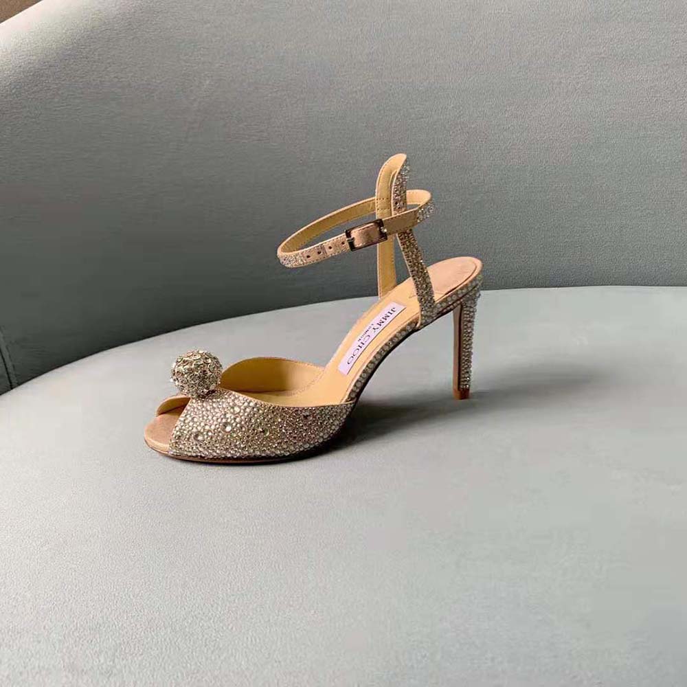Back view highlighting ankle strap and heel on Jimmy Choo Sacora 100 sandals