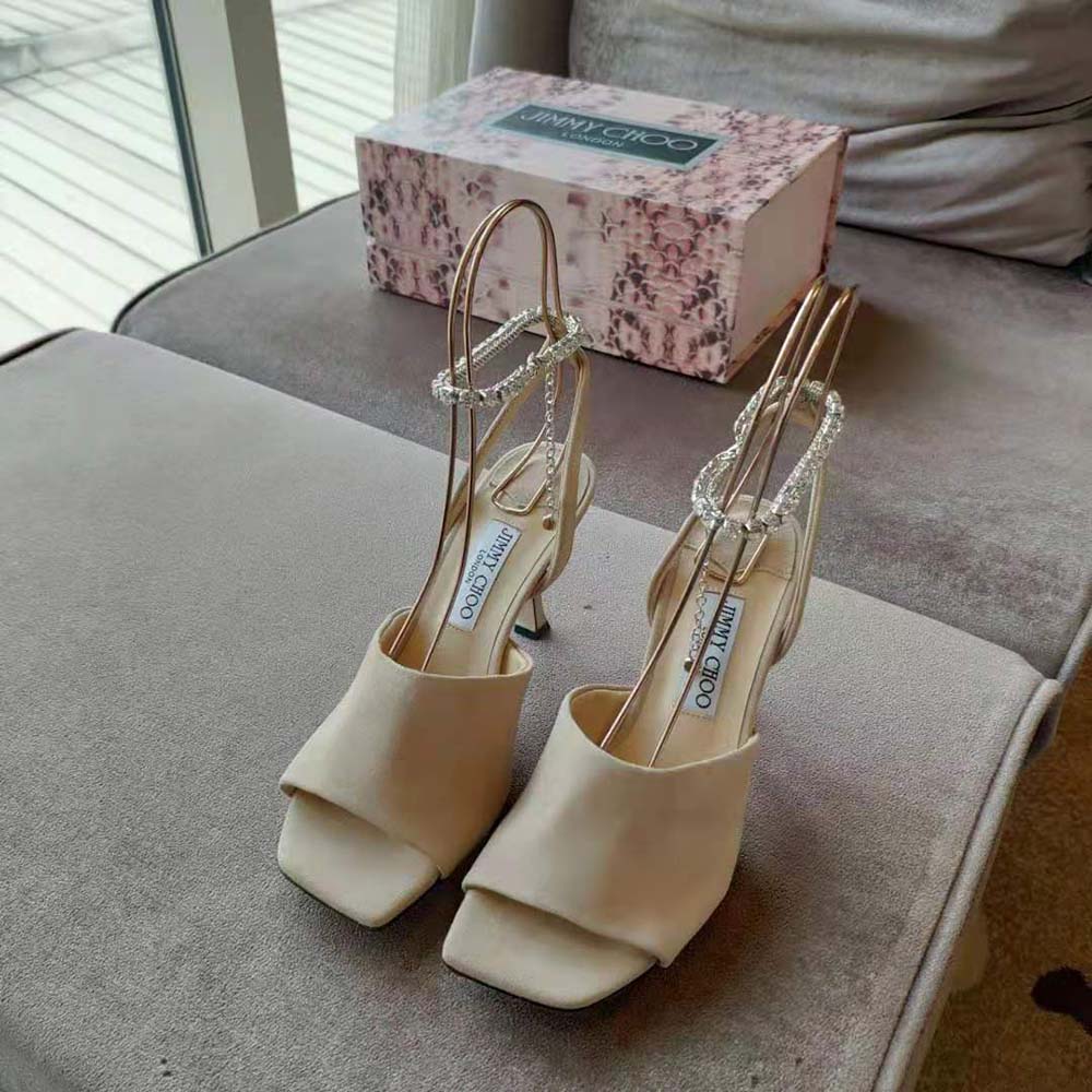 Top-down angle showing sandy suede and buckle on Jimmy Choo Women Sae 90