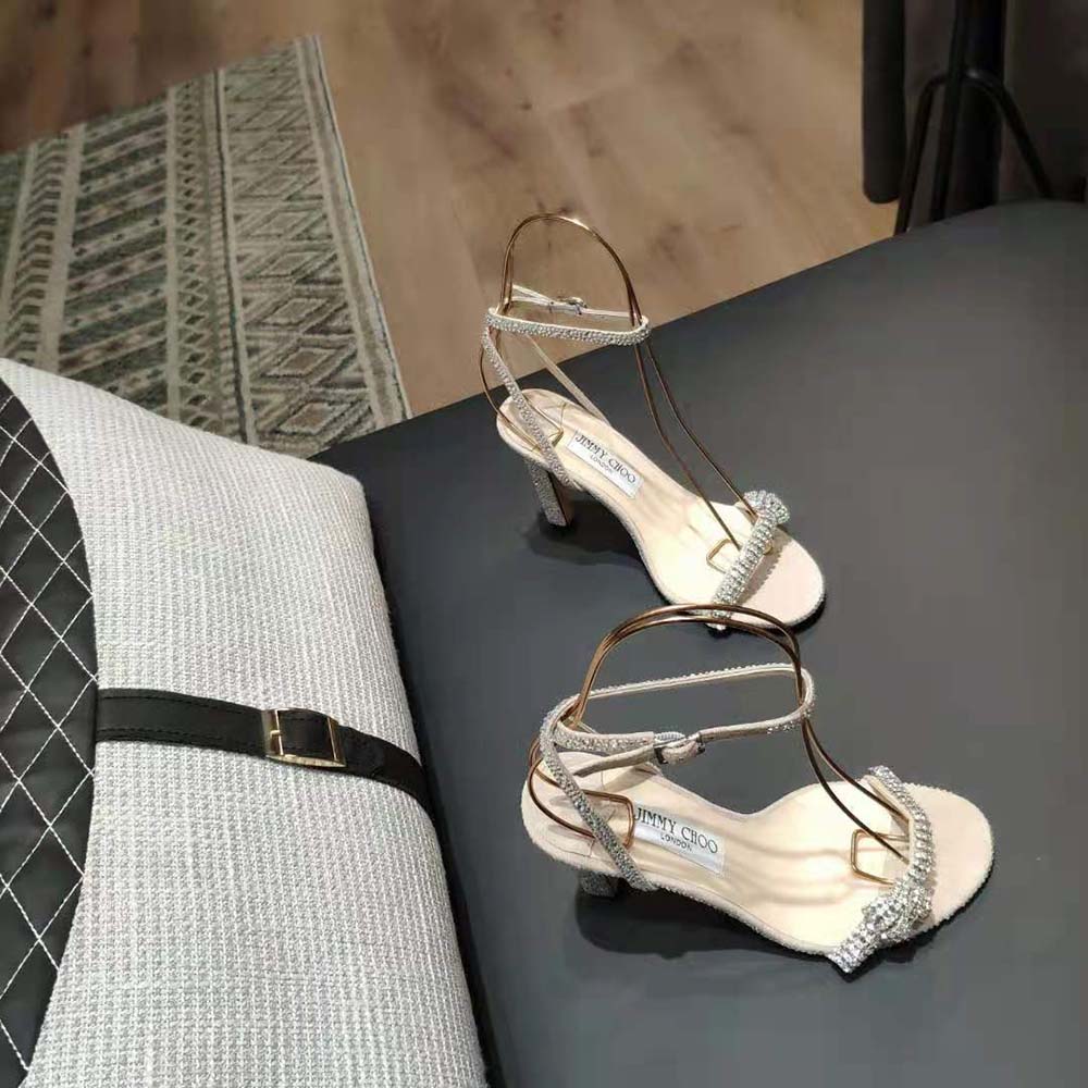 Close-up of pavé crystal cord detail on Jimmy Choo Women Thyra 100 Nude Suede Sandals