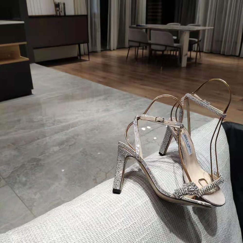 Top view of Jimmy Choo Women Thyra 100 Nude Suede Sandals highlighting ankle strap