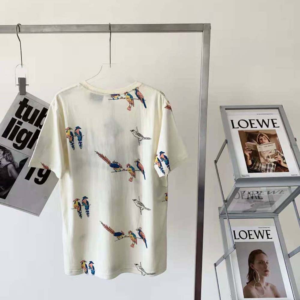 Side angle showing relaxed fit of Loewe Women Parrot Print T-shirt