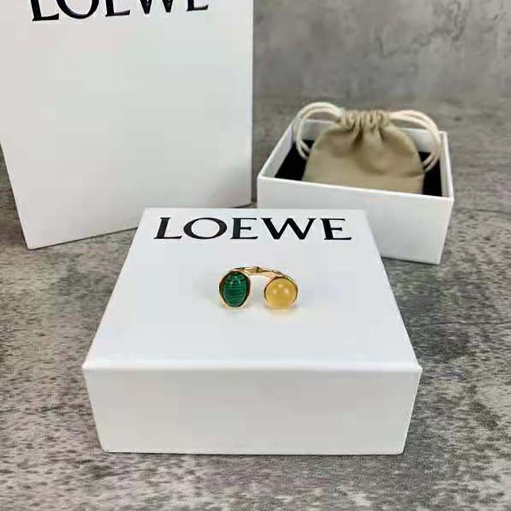Loewe Women Tree Ring in Metal displayed on model's hand with outfit
