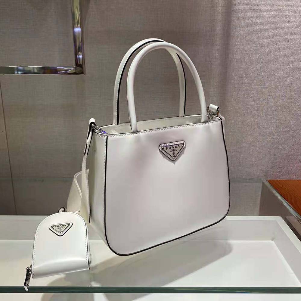 Side view showcasing silver hardware on Prada Women Handbag Nylon Lining-White