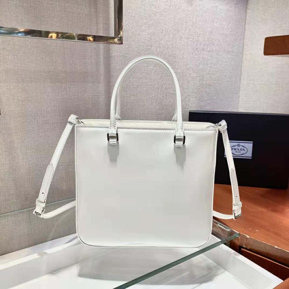 Side angle highlighting spacious interior and zip closure of Prada Women Tote
