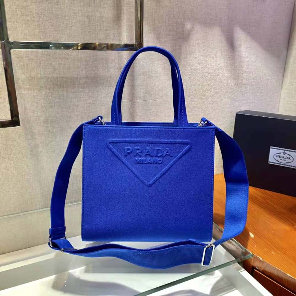 Side angle highlighting handle design of Prada Women Drill Tote Handles Bag-Blue