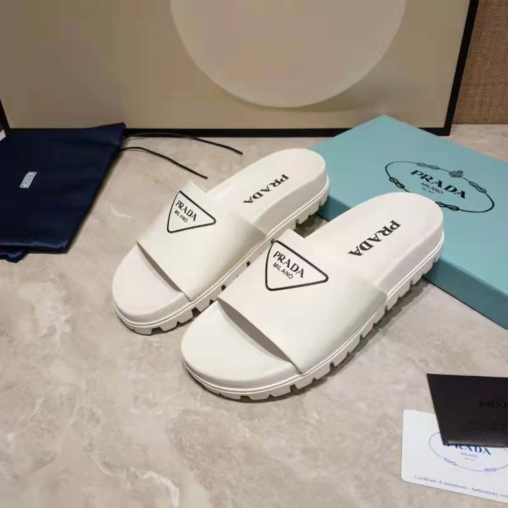 Top angle of Prada Women Leather Slides in 20mm Heel-White displaying open-slip design