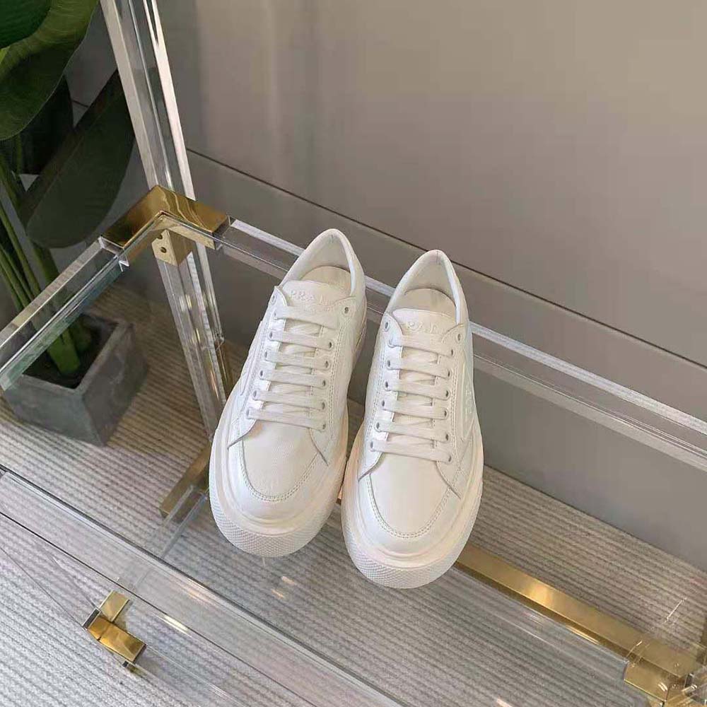 Close-up of white brushed leather detail on Prada Women Macro Sneakers