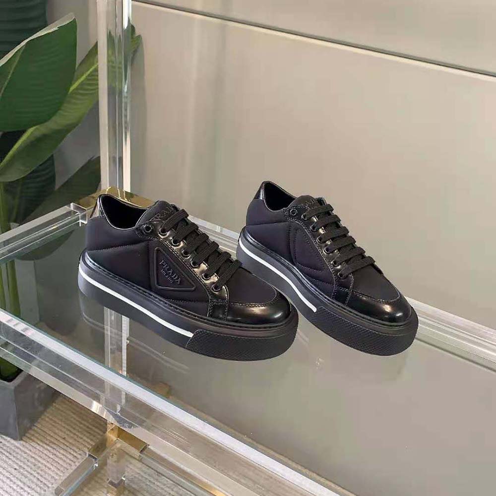 Overhead shot showing chunky silhouette of Prada black sneakers